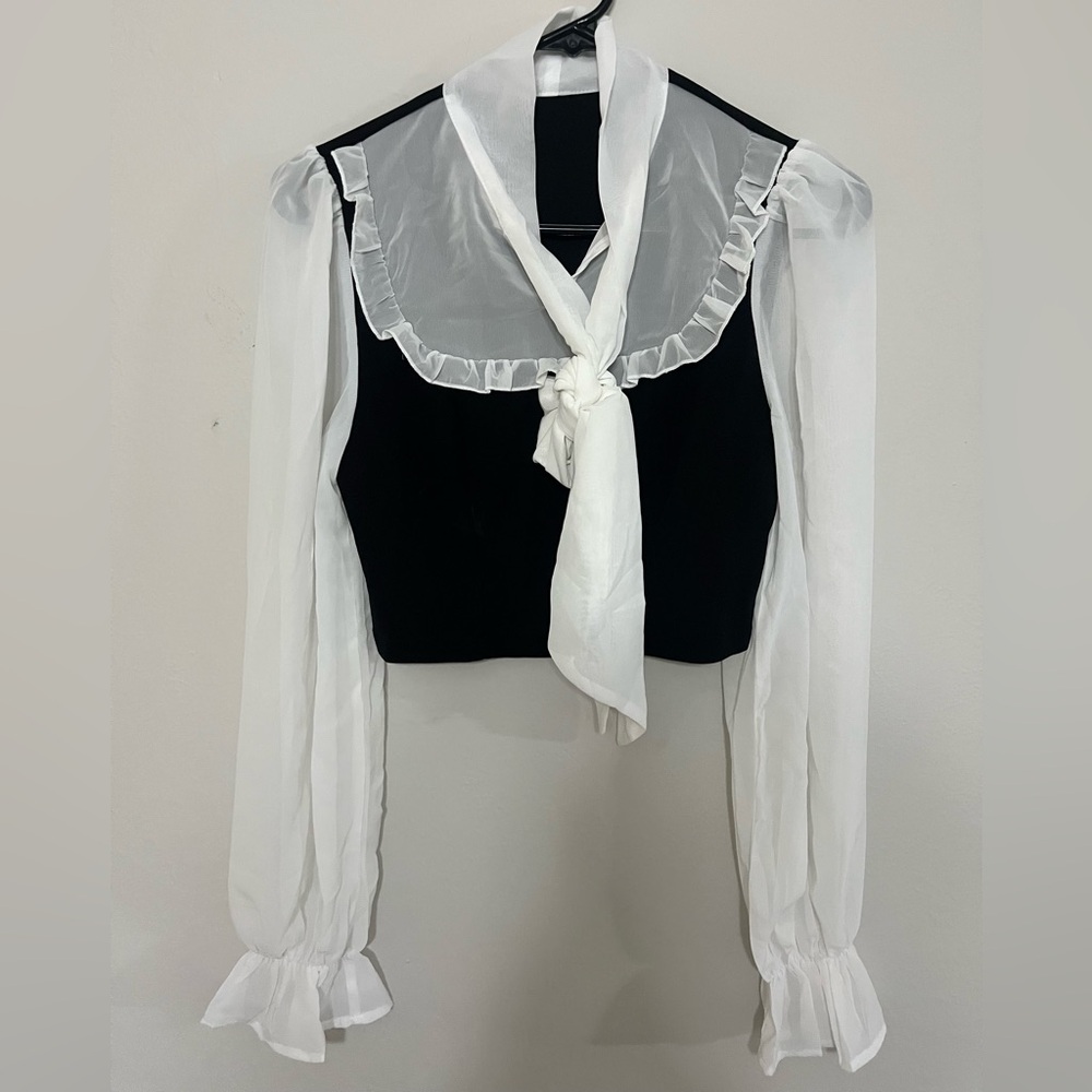 Sophisticated Black and White Blouse with Scarf Detail